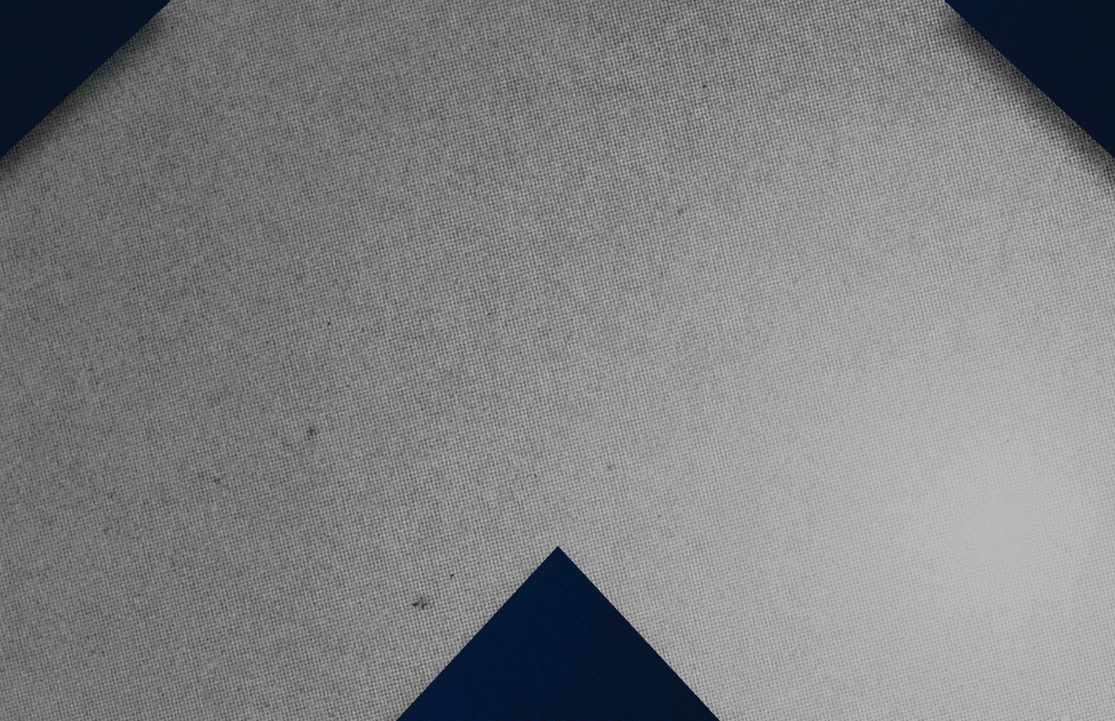 A red and black triangle. Description generated by AI