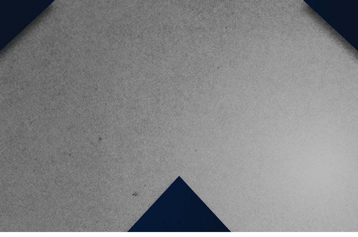 A red and black triangle. Description generated by AI