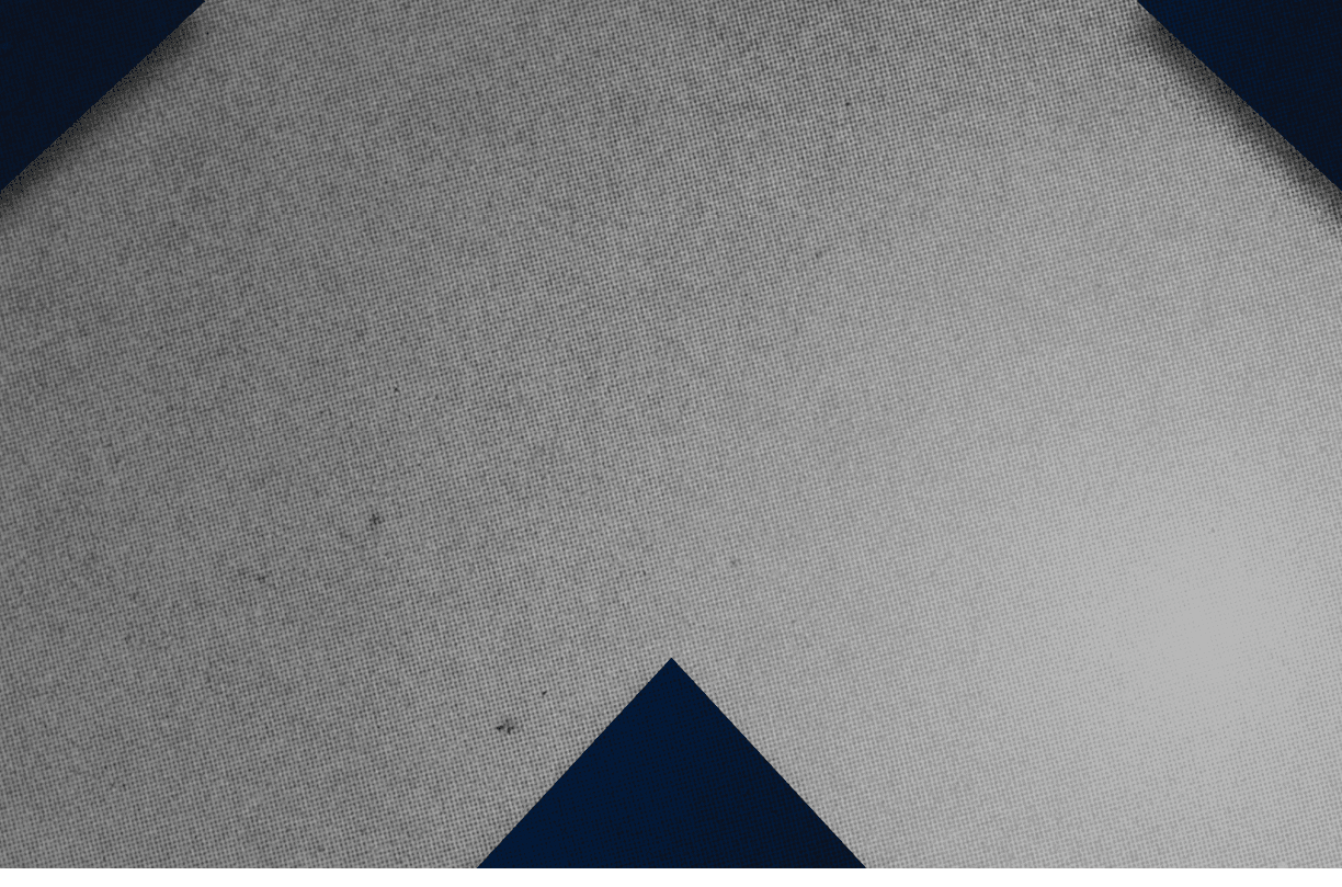 A red and black triangle. Description generated by AI