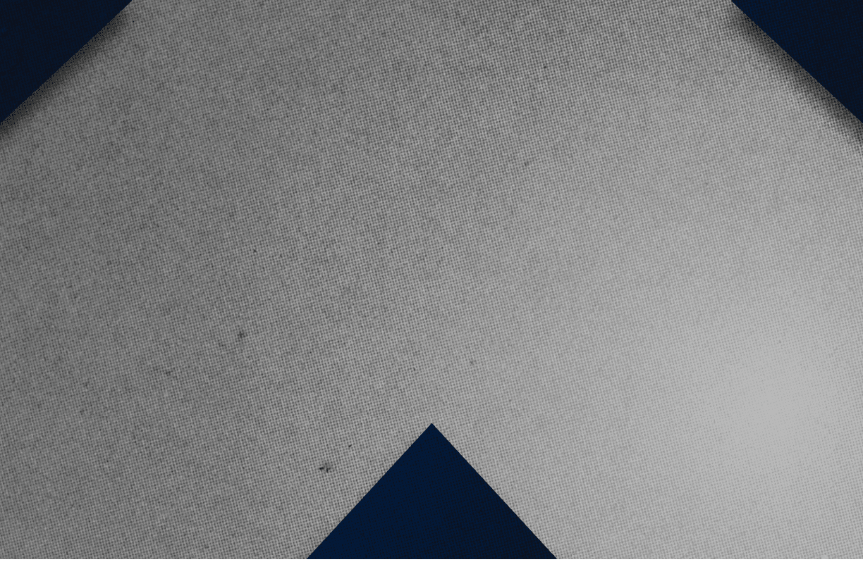 A red and black triangle. Description generated by AI