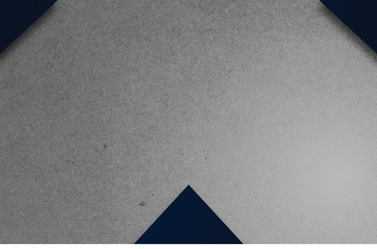 A red and black triangle. Description generated by AI