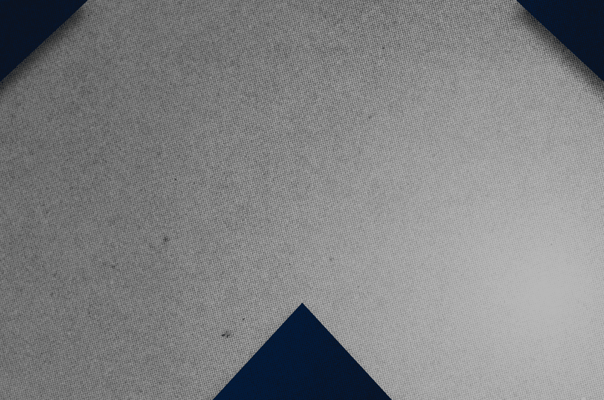 A red and black triangle. Description generated by AI