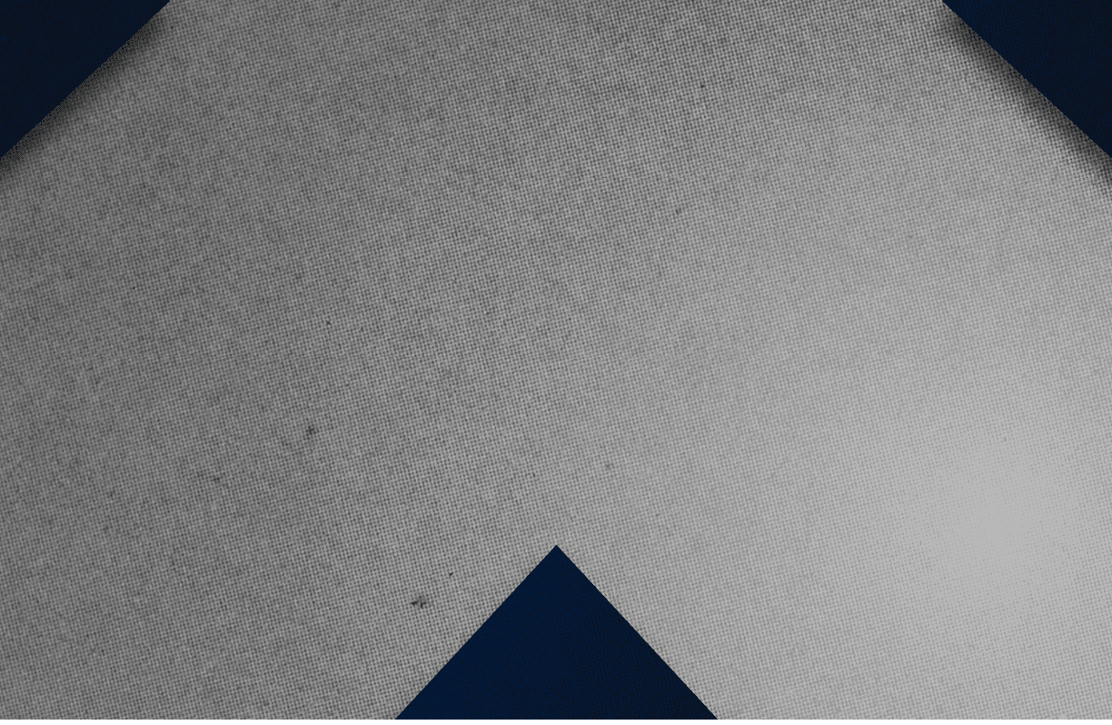 A red and black triangle. Description generated by AI
