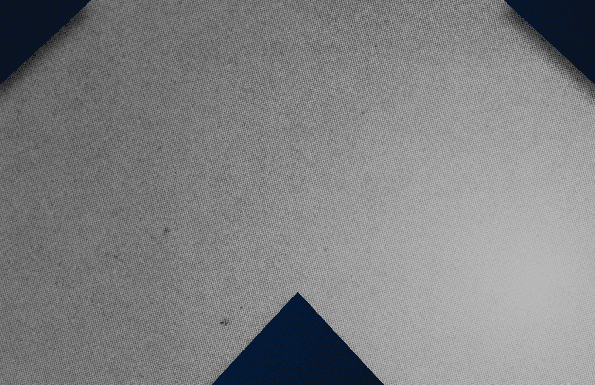 A red and black triangle. Description generated by AI