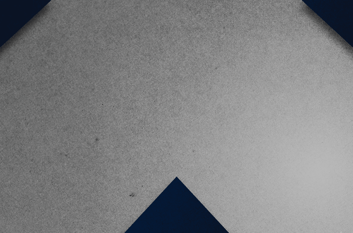 A red and black triangle. Description generated by AI