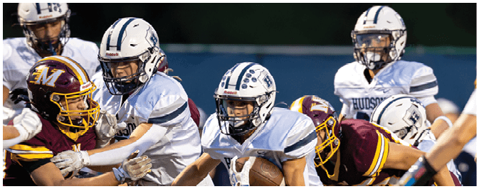 A football player is sliding on the ground. Description generated by AI