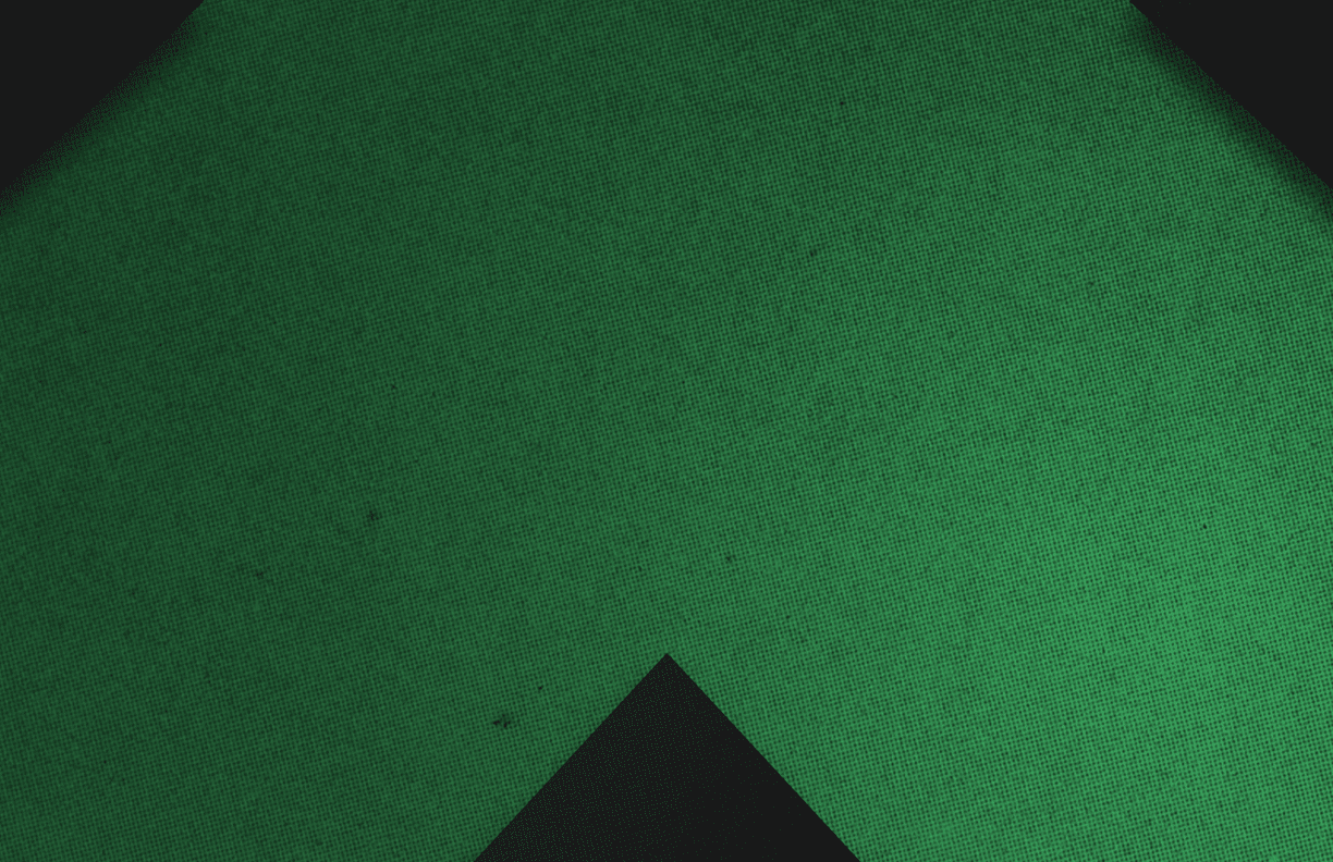 A red and black triangle. Description generated by AI