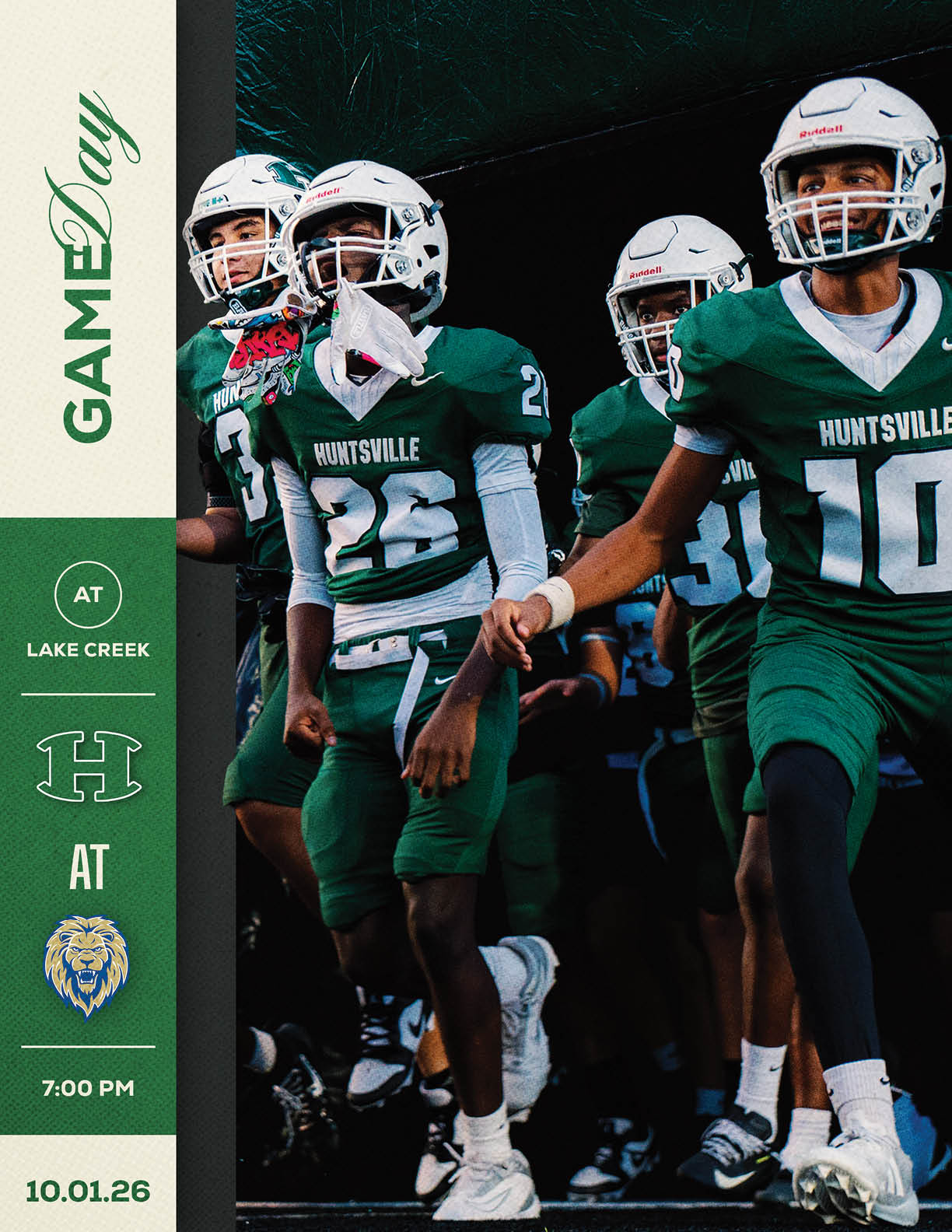 A football player wearing a green jersey with the number 12 on it. Description generated by AI