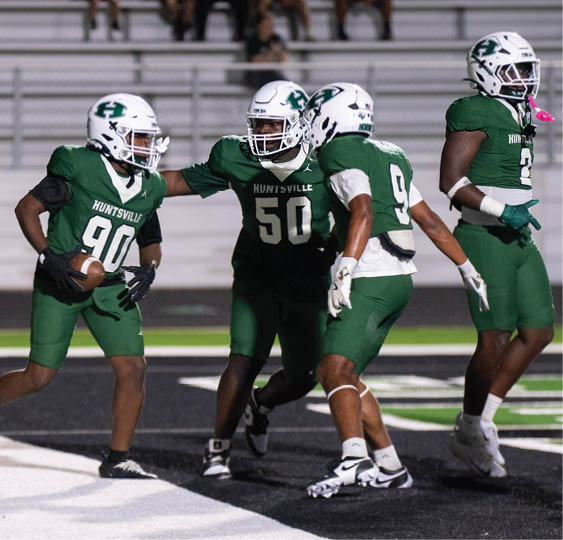 A group of football players celebrating a victory. AI generated content