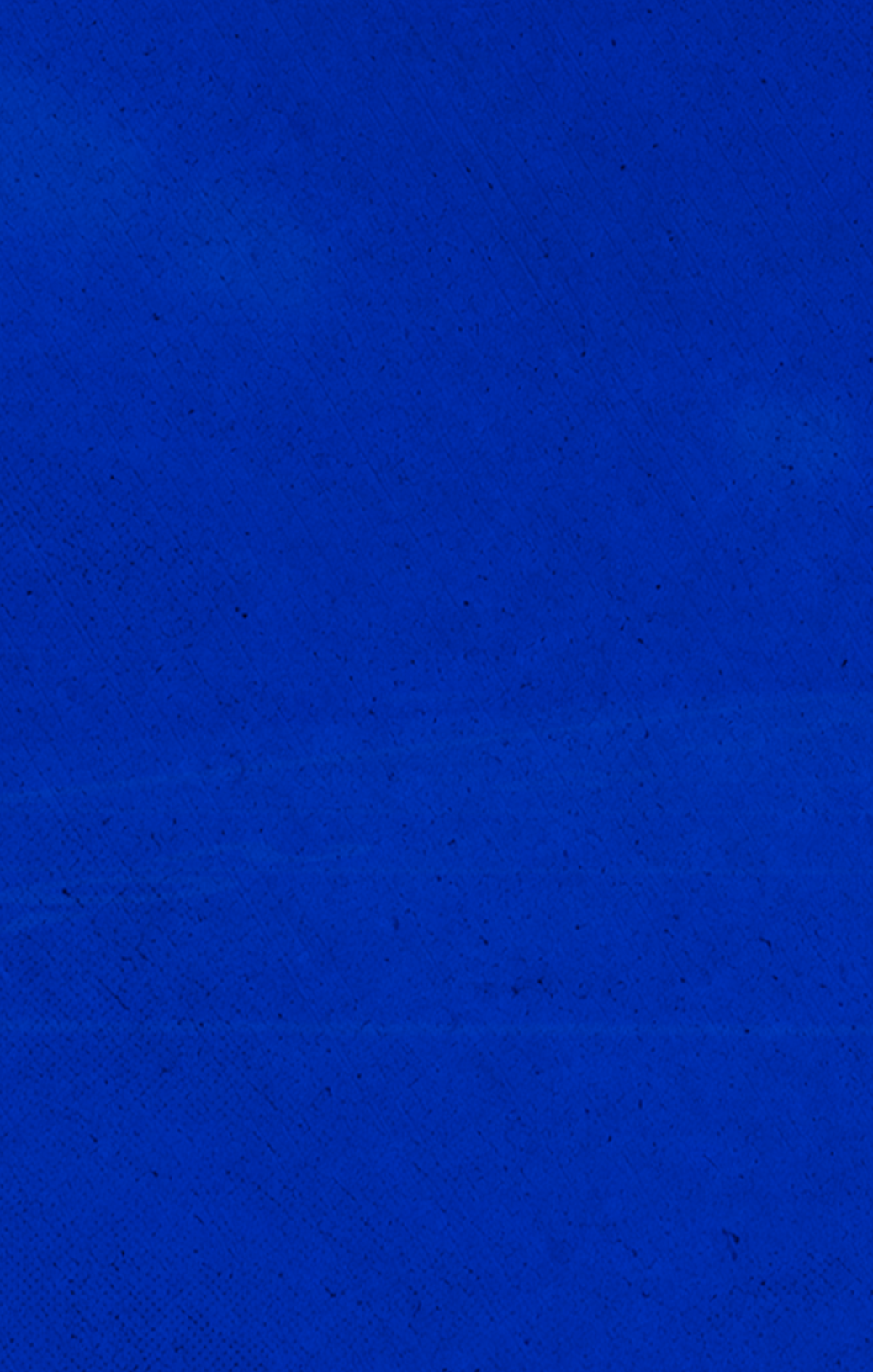 A blue sky with no clouds. Description generated by AI