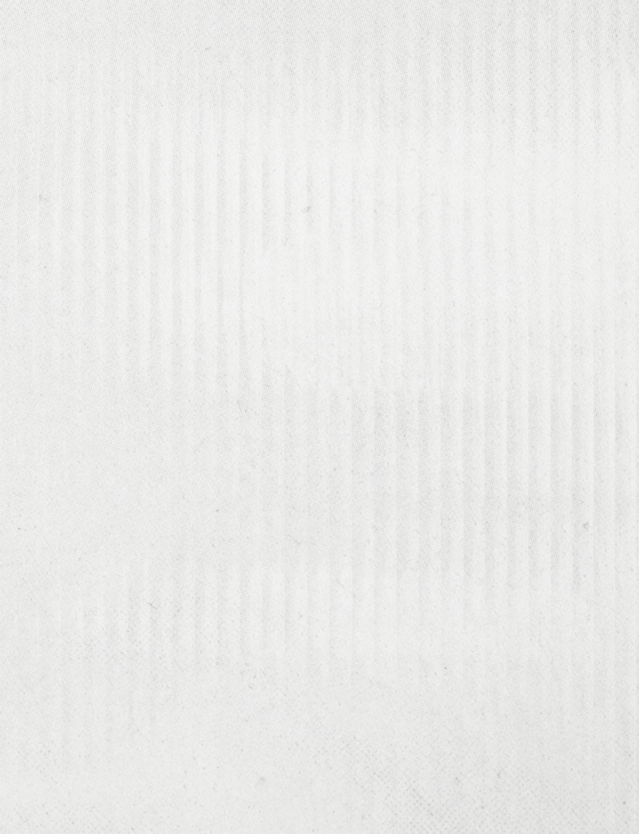 A white cloth with a pattern. Description generated by AI