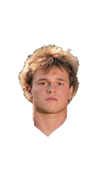 A man with curly hair is in the center of the picture. Description generated by AI