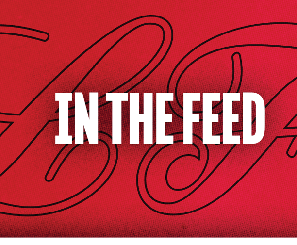A black and red sign with the words “in the feed" written in white. Description generated by AI