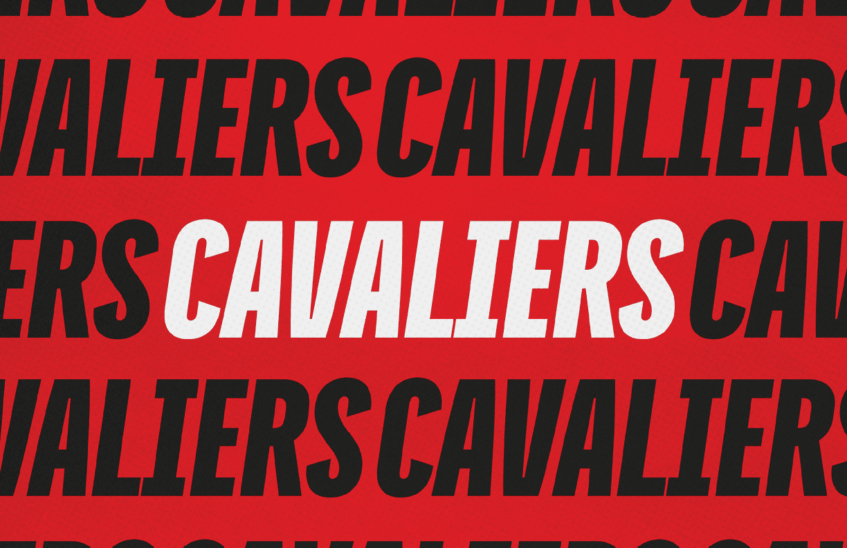 A close-up of a black football helmet with red and white “LT" lettering and bold red and white text above it reading "CAVALIER DU ROC." Description generated by AI