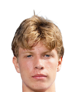 A person with short, tousled hair wearing a white football jersey with the number 44 is holding a football on a sports field. Description generated by AI