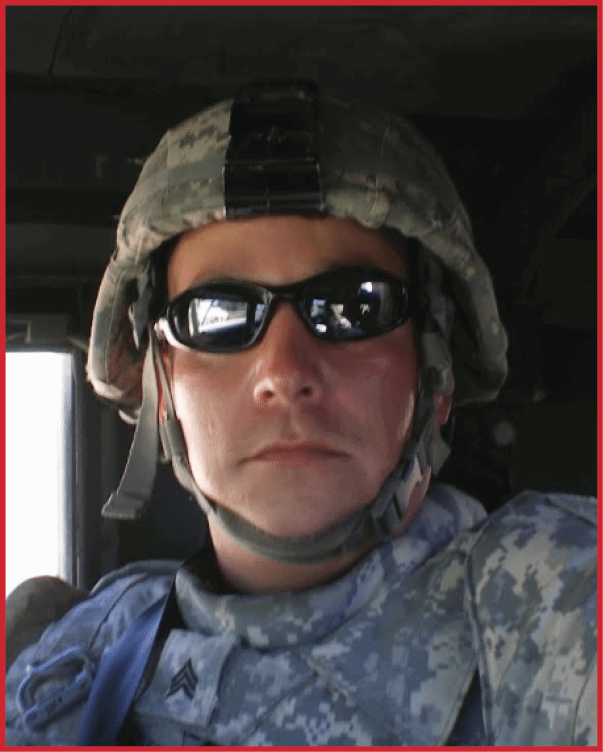 Person wearing military camouflage uniform, helmet, and sunglasses inside a vehicle. Description generated by AI