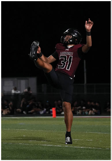 A football player wearing a blue jersey with the number 58 on it. Description generated by AI