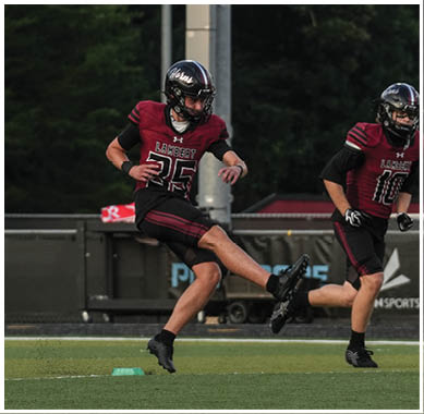 A football player wearing a blue jersey with the number 58 on it. Description generated by AI