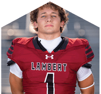 A young man wearing a white jersey with the number 10 on it. Description generated by AI