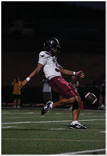 A group of football players celebrating a touchdown. Description generated by AI