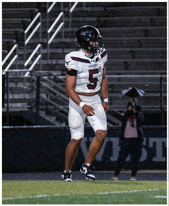 A group of football players celebrating a touchdown. Description generated by AI
