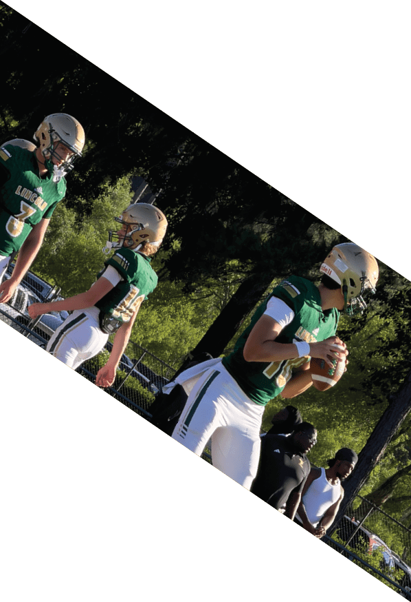 A group of young men wearing black and white uniforms are standing on a field. AI generated content