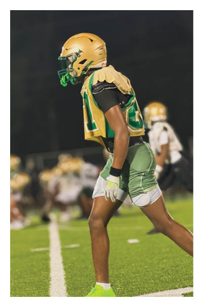 A young man wearing a football jersey with the name Vista on the back. AI generated content