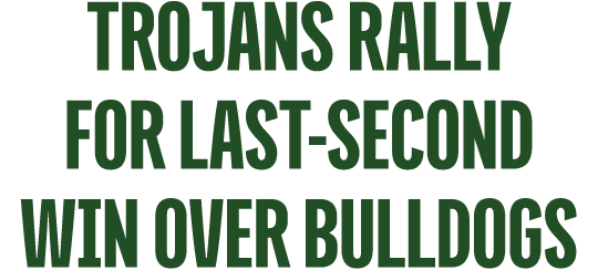 Trojans Rally for Last Second Win Over Bulldogs