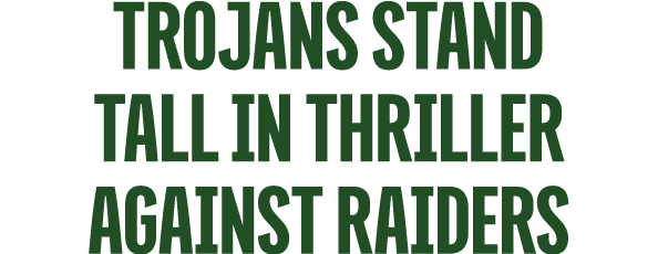 Trojans Stand Tall in Thriller Against Raiders