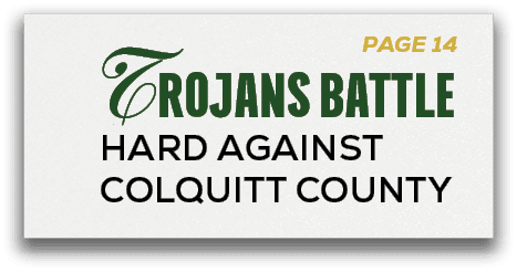 PAGE 14,Trojans BATTLE Hard Against Colquitt Count