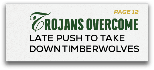 PAGE 12,Trojans OVERCOME Late Push to Take Down Timberwolve
