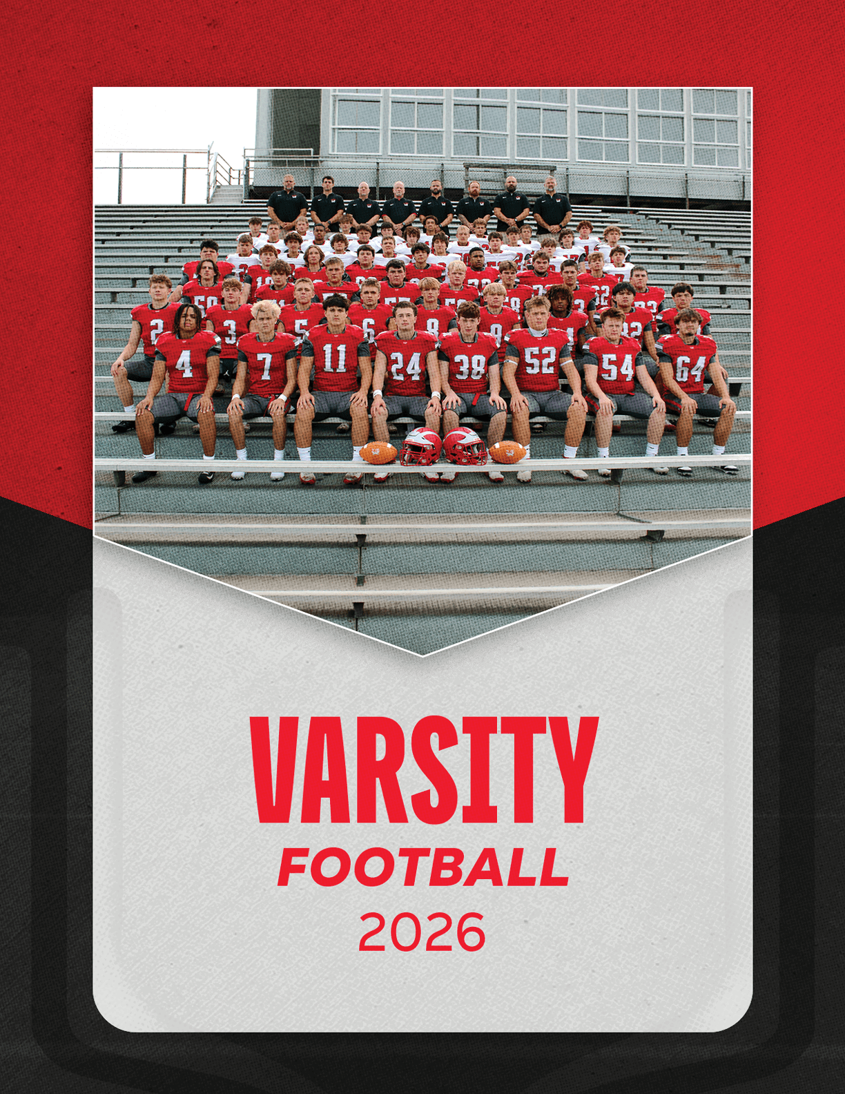 A group of football players sitting on a bench. Description generated by AI