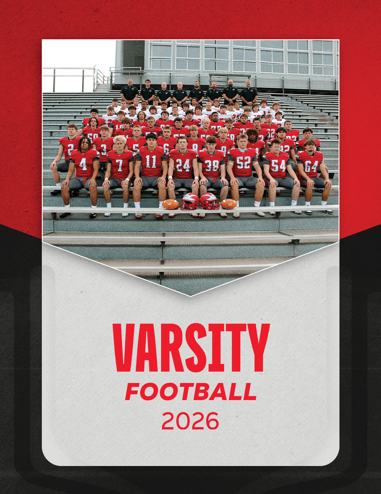 A group of football players sitting on a bench. Description generated by AI