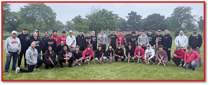 A group of people wearing athletic clothing pose together on an indoor track with a wall of sports records behind them and green text overlay reading “24 of 39 5 STAR OFF SEASON STUDS." Description generated by AI