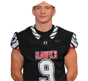 A young man wearing a white jersey with the number 10 on it. Description generated by AI