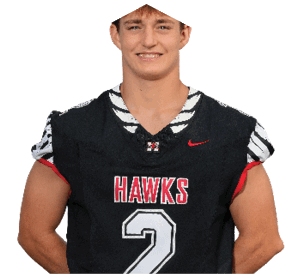A young man wearing a white jersey with the number 10 on it. Description generated by AI