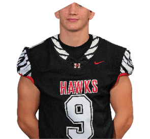 A young man wearing a white jersey with the number 10 on it. Description generated by AI