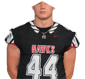A young man wearing a white jersey with the number 10 on it. Description generated by AI