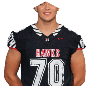 A young man wearing a white jersey with the number 10 on it. Description generated by AI