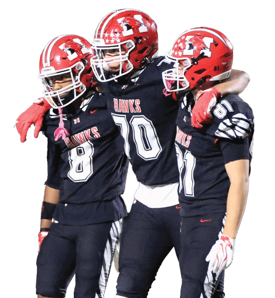 Three people wearing black football uniforms with red helmets and pink socks are walking together on a football field. Description generated by AI