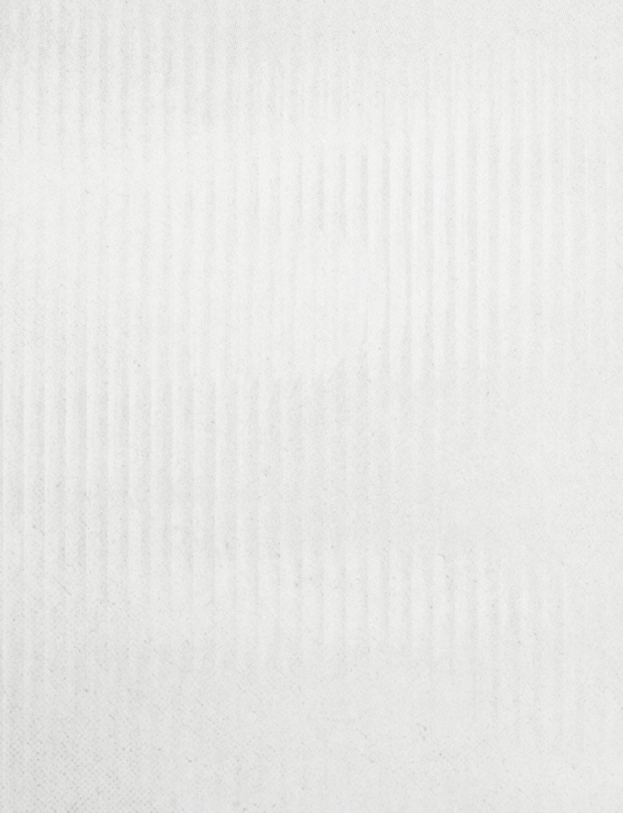 White cloth with a pattern. Description generated by AI