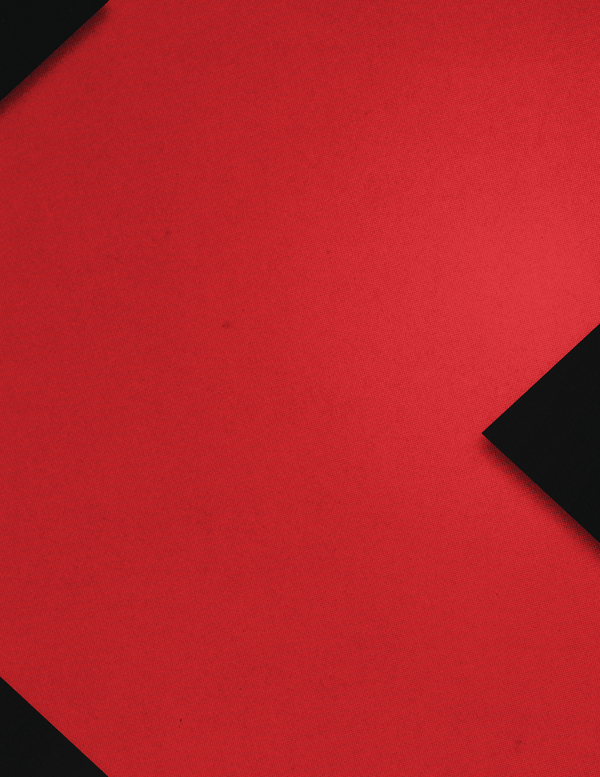 Orange square with a black triangle. Description generated by AI