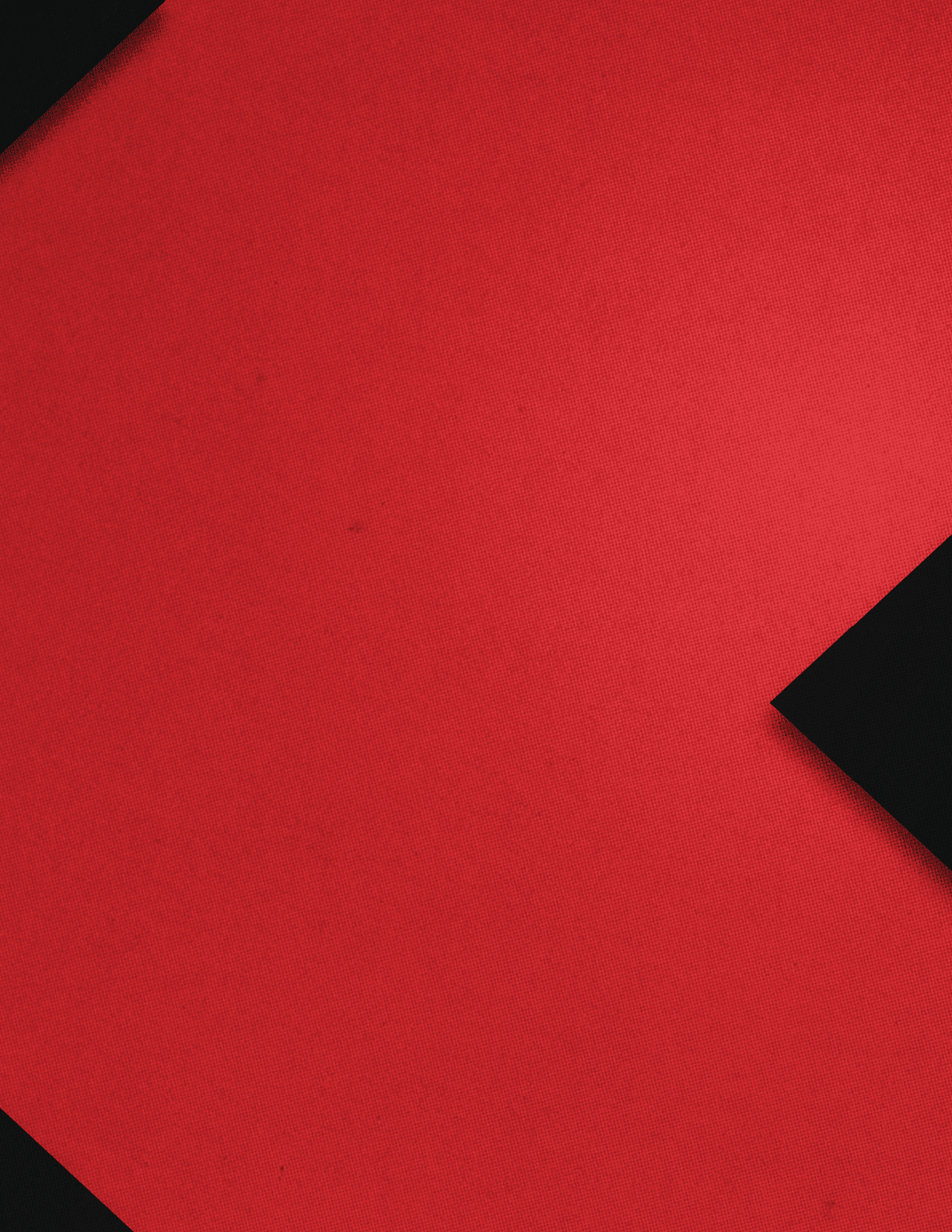 Orange square with a black triangle. Description generated by AI