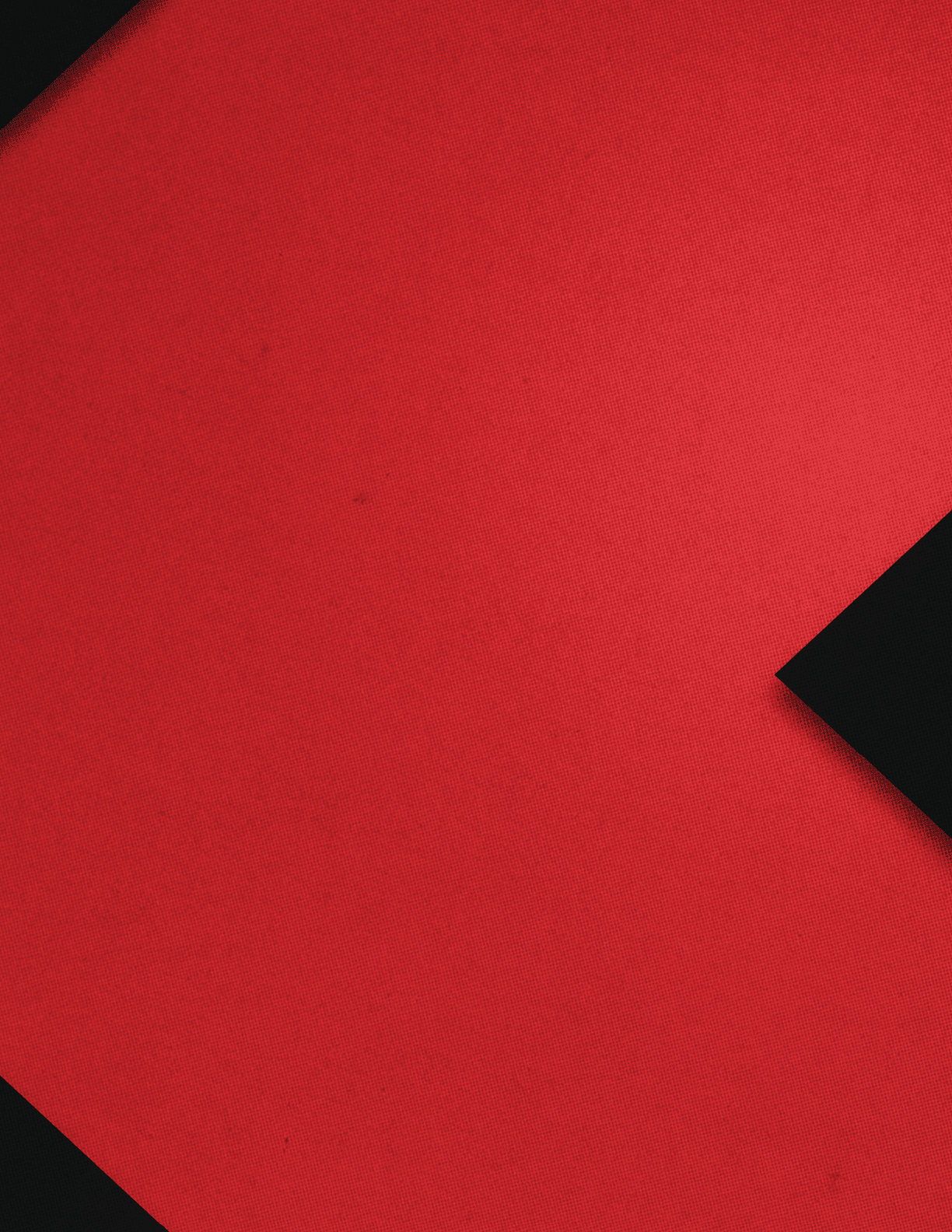 Orange square with a black triangle. Description generated by AI
