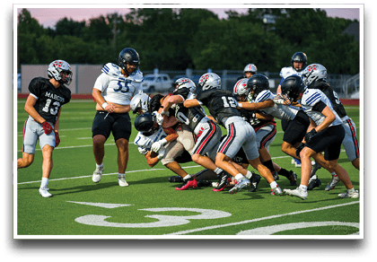 Three football players are standing on the field, one of them is smiling and wearing a black jersey with the number 55. AI generated content