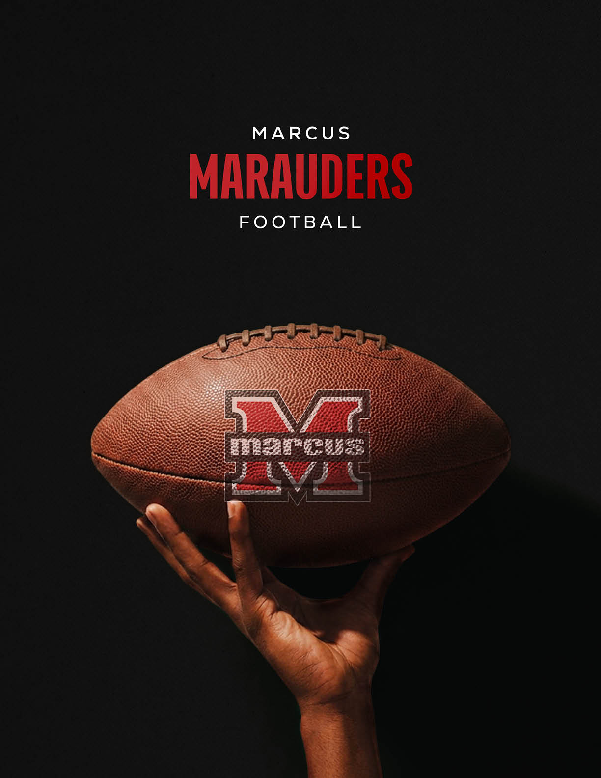 A hand is holding a football with the Marcus Marauders logo on it against a black background with the text Marcus Marauders Football above. Description generated by AI