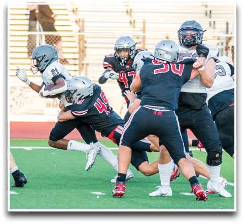 Three football players are standing on the field, one of them is smiling and wearing a black jersey with the number 55. AI generated content
