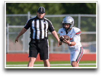 Three football players are standing on the field, one of them is smiling and wearing a black jersey with the number 55. AI generated content