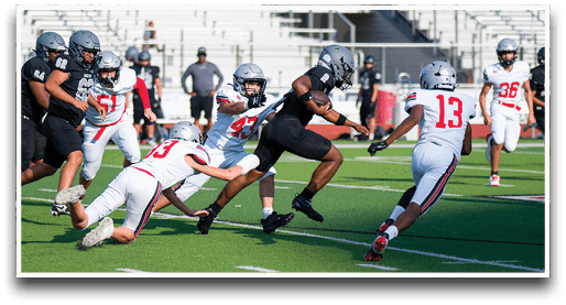 Three football players are standing on the field, one of them is smiling and wearing a black jersey with the number 55. AI generated content