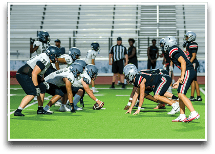 Three football players are standing on the field, one of them is smiling and wearing a black jersey with the number 55. AI generated content